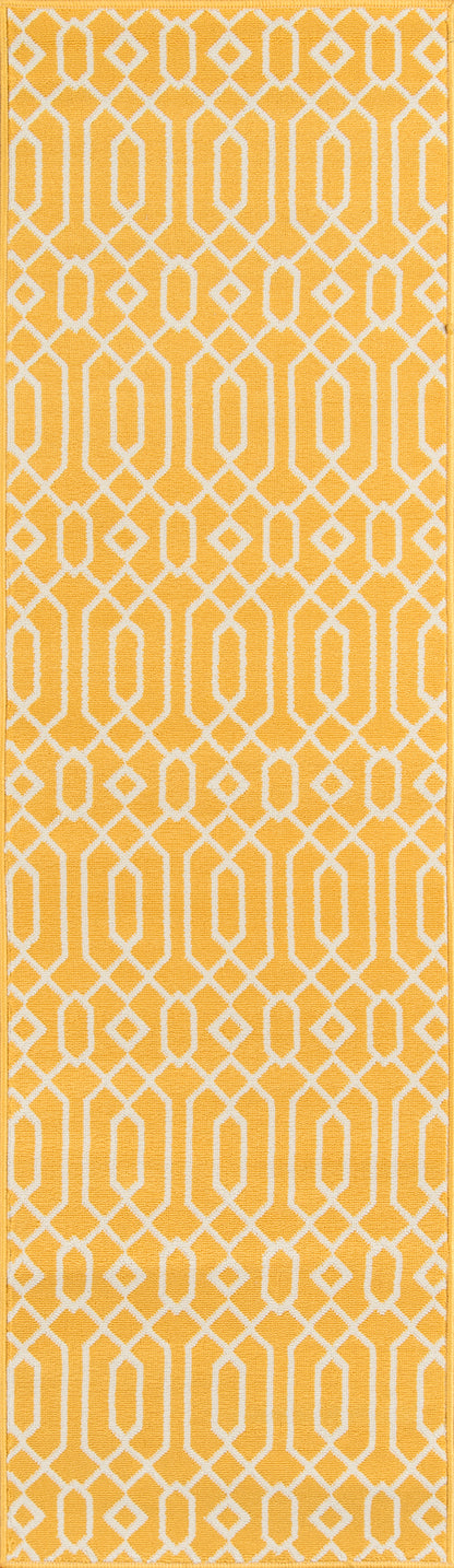 Mustard-yellow rug with a white interlocking geometric lattice pattern.
