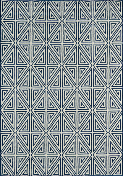 Navy blue rug with a white nested-triangle geometric pattern in a repeating grid.