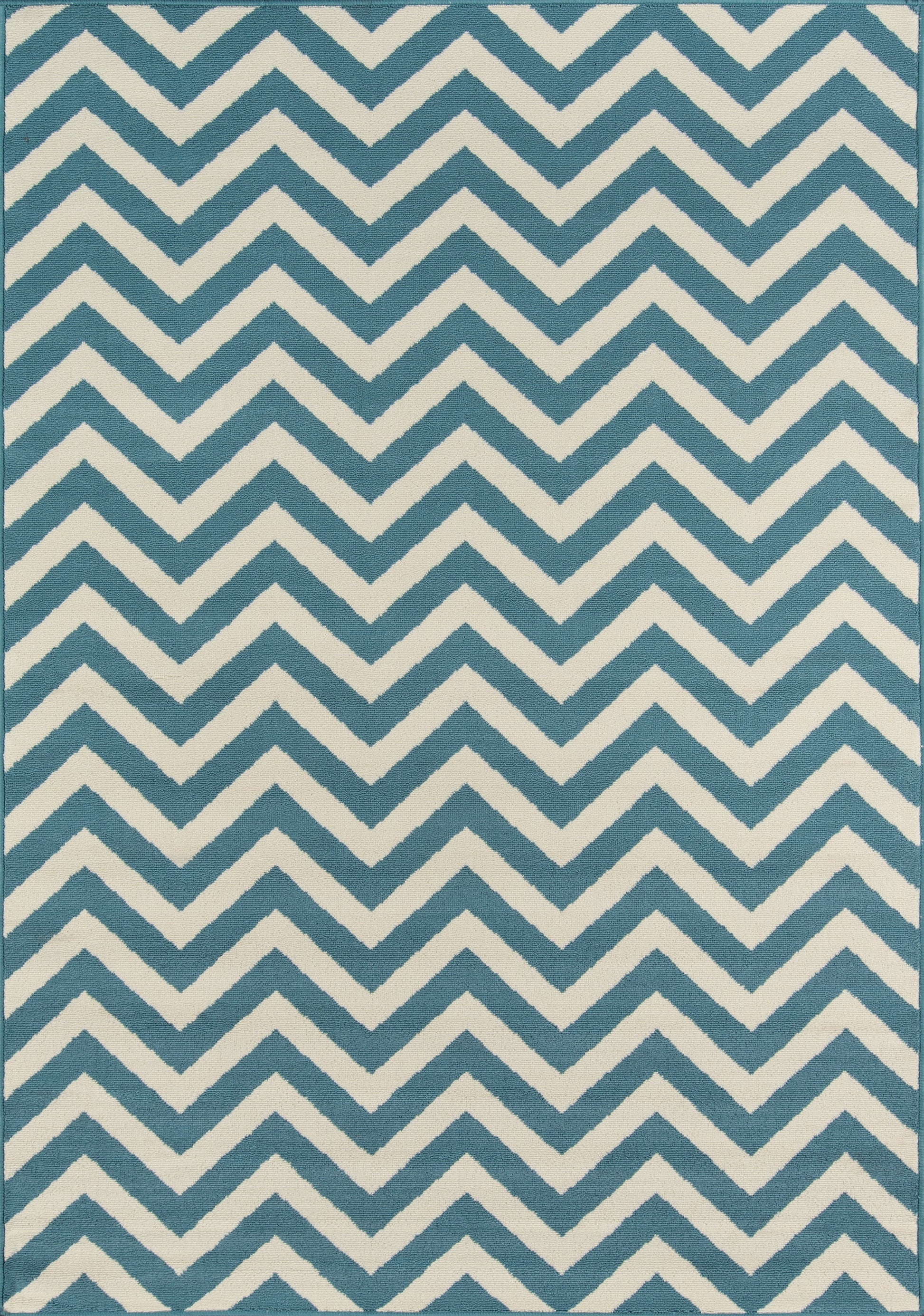 Blue-teal gradient rug with white zigzag chevron borders along the edges.