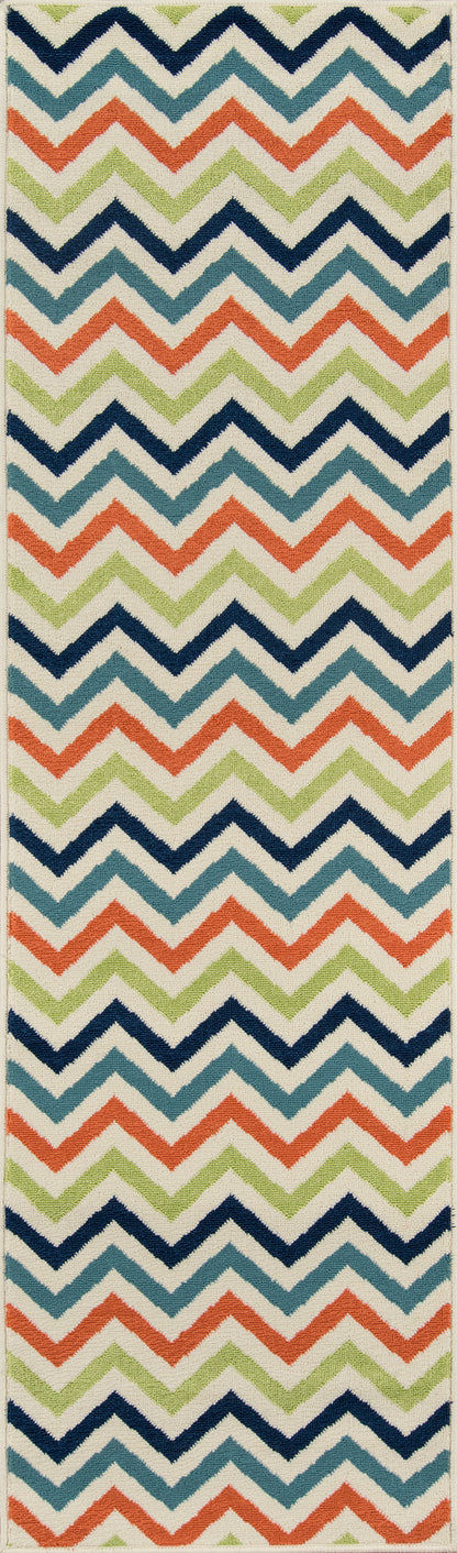 Chevron zigzag rug in navy, teal, coral, lime green on cream; contemporary coastal style.