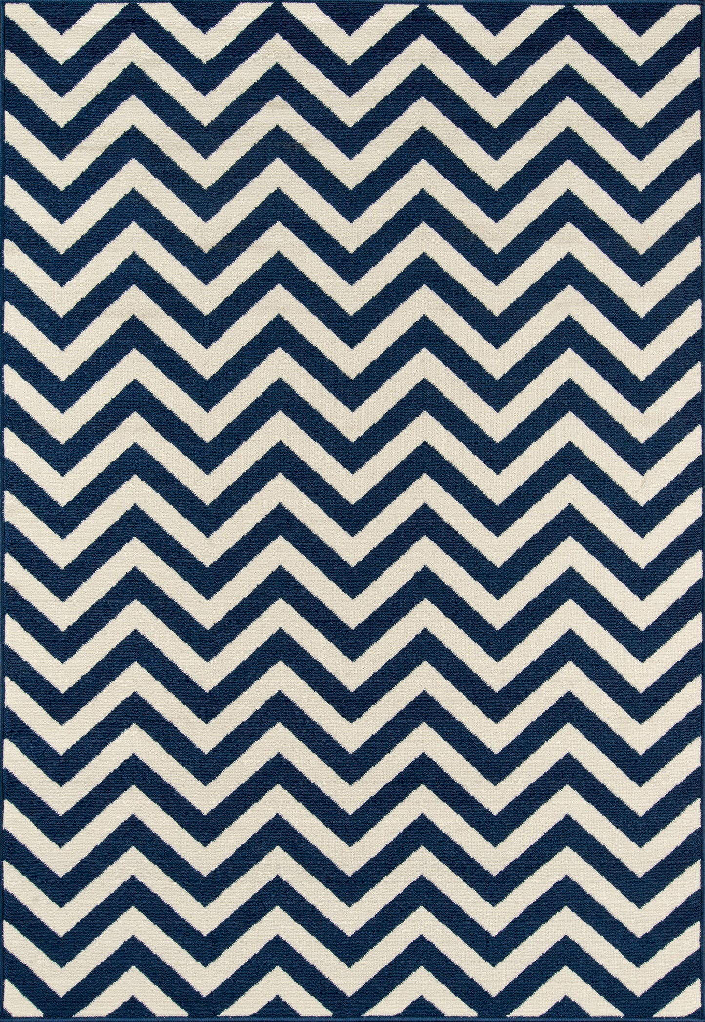 Navy and cream chevron rug with bold zigzag pattern, rectangular area rug for modern living spaces.