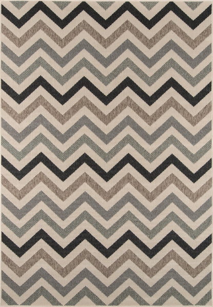 Chevron rug with neutral beige, gray, taupe and black zigzag pattern; soft woven texture, rectangular shape.