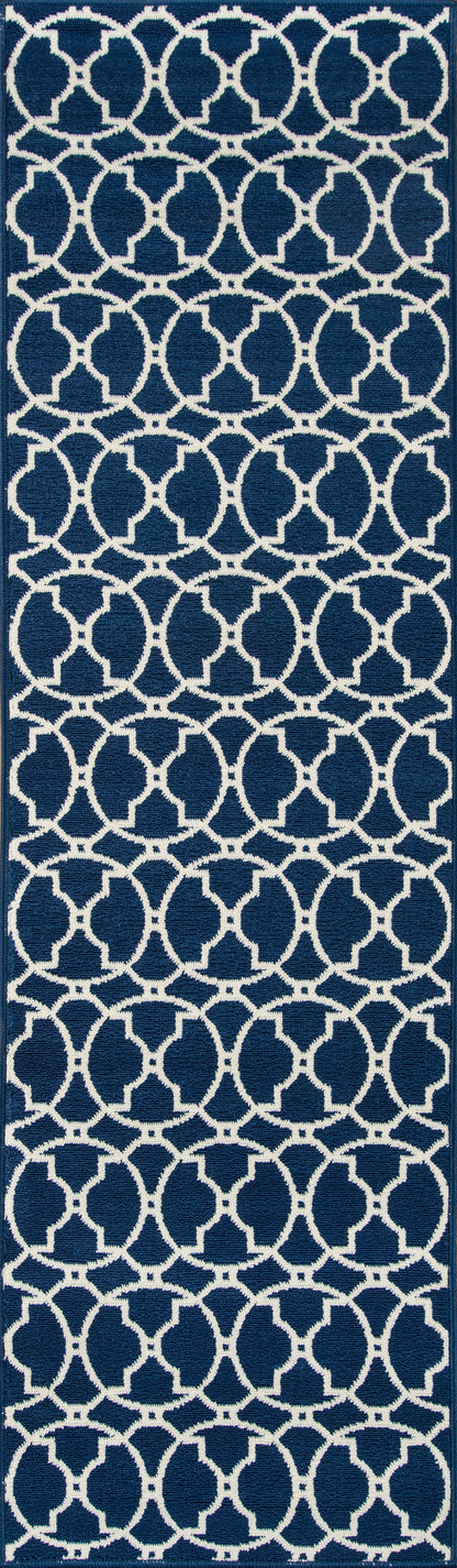 Navy blue rug with a repeating white interlocking circle lattice pattern; geometric rug design for home decor.