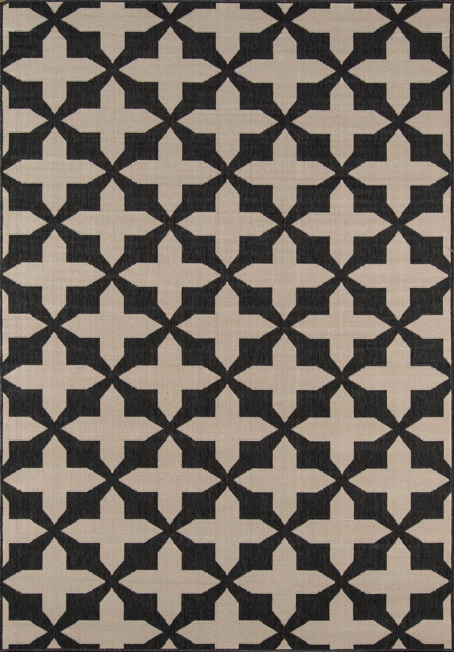 Beige 2' x 4' rug with dark navy cross motifs in a repeating grid; textured woven surface.