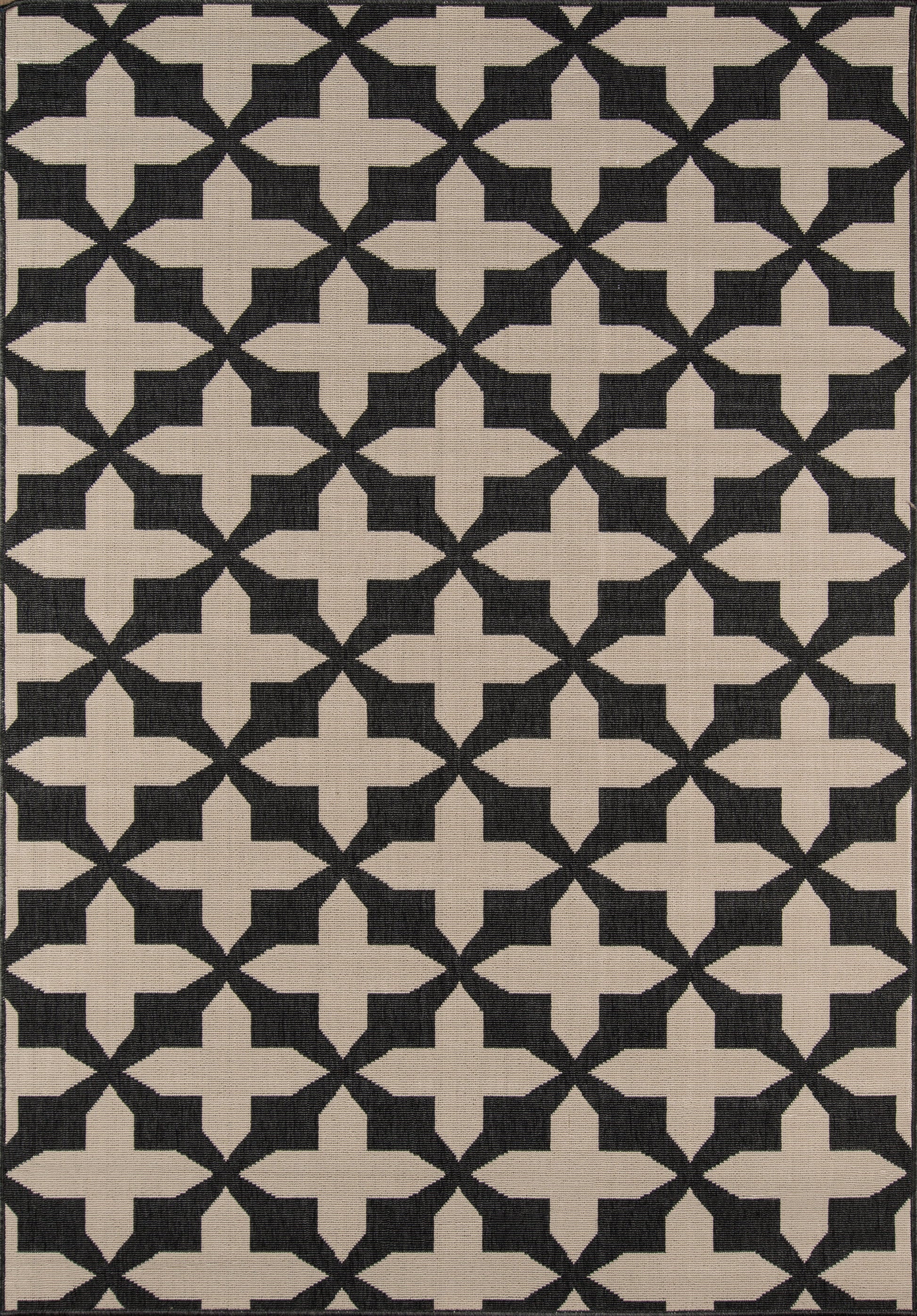 Beige 2' x 4' rug with dark navy cross motifs in a repeating grid; textured woven surface.