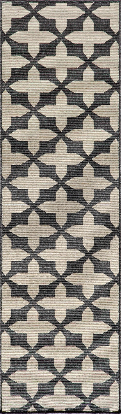 Narrow geometric rug with beige cross motifs on dark background; woven lattice pattern.