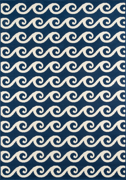 Navy rug with repeating white sea-wave swirls, coastal style, rectangular with a dark border.