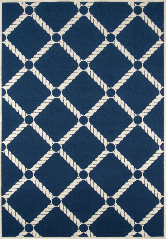 Navy blue woven rug with white rope-diamond lattice pattern and circular nodes.