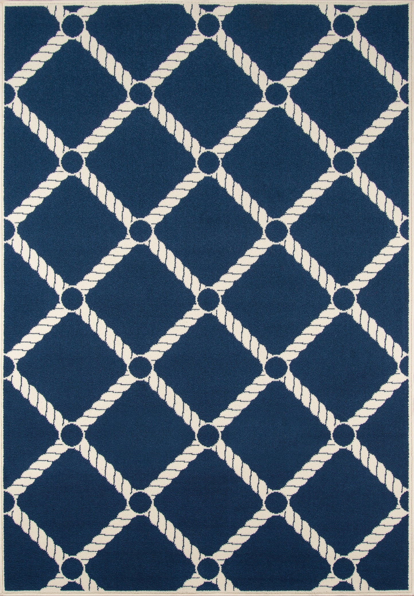 Navy blue rug with a white rope-diamond lattice pattern and circular nodes at intersections.