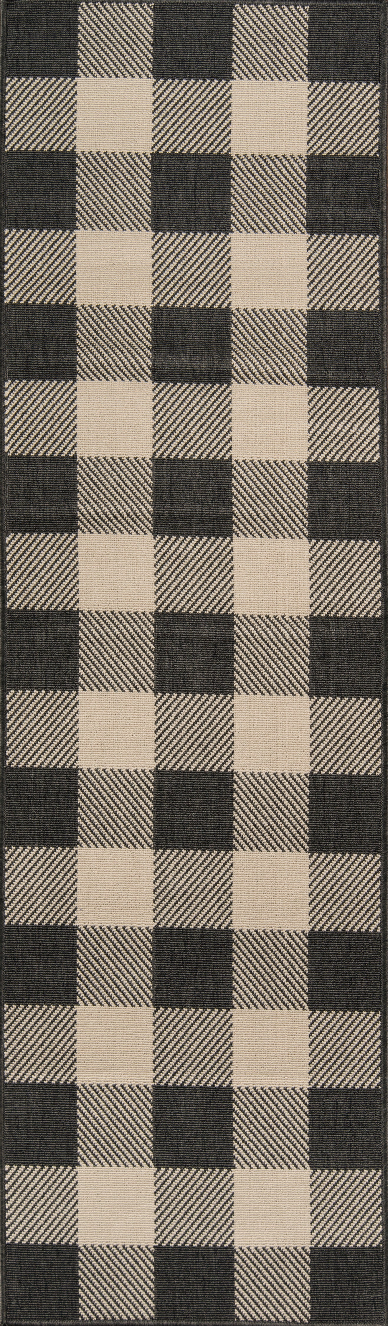 Woven buffalo-check rug in black and beige; rectangular 7' x 10' area rug.