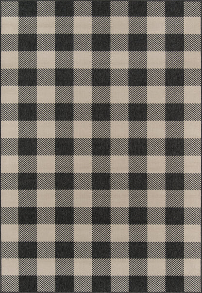 Black and beige checkered woven rug with large squares; classic plaid pattern.