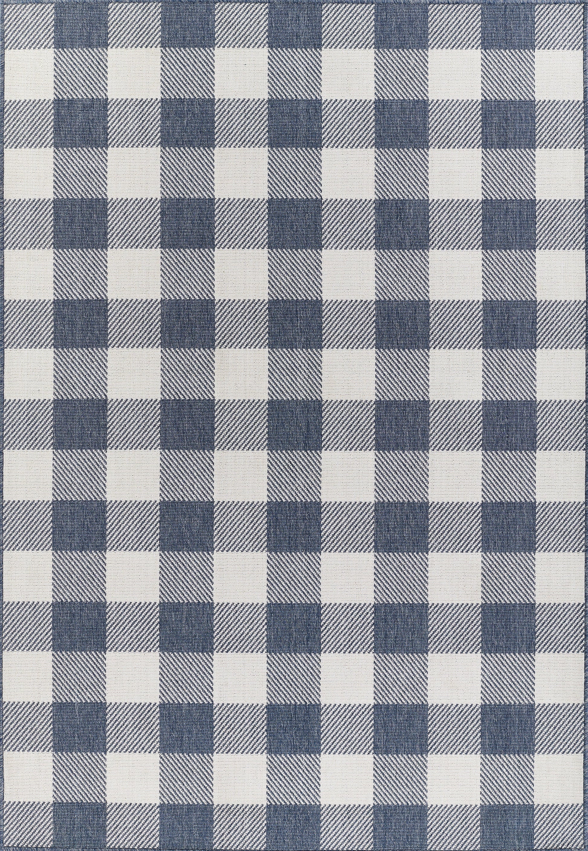 Blue and white gingham rug with denim-textured squares, 8' x 11'.