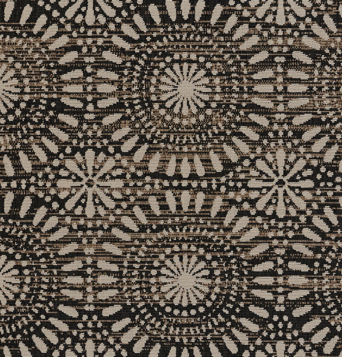 Beige and black woven rug with repeating circular mandala rosettes and geometric radiating pattern.