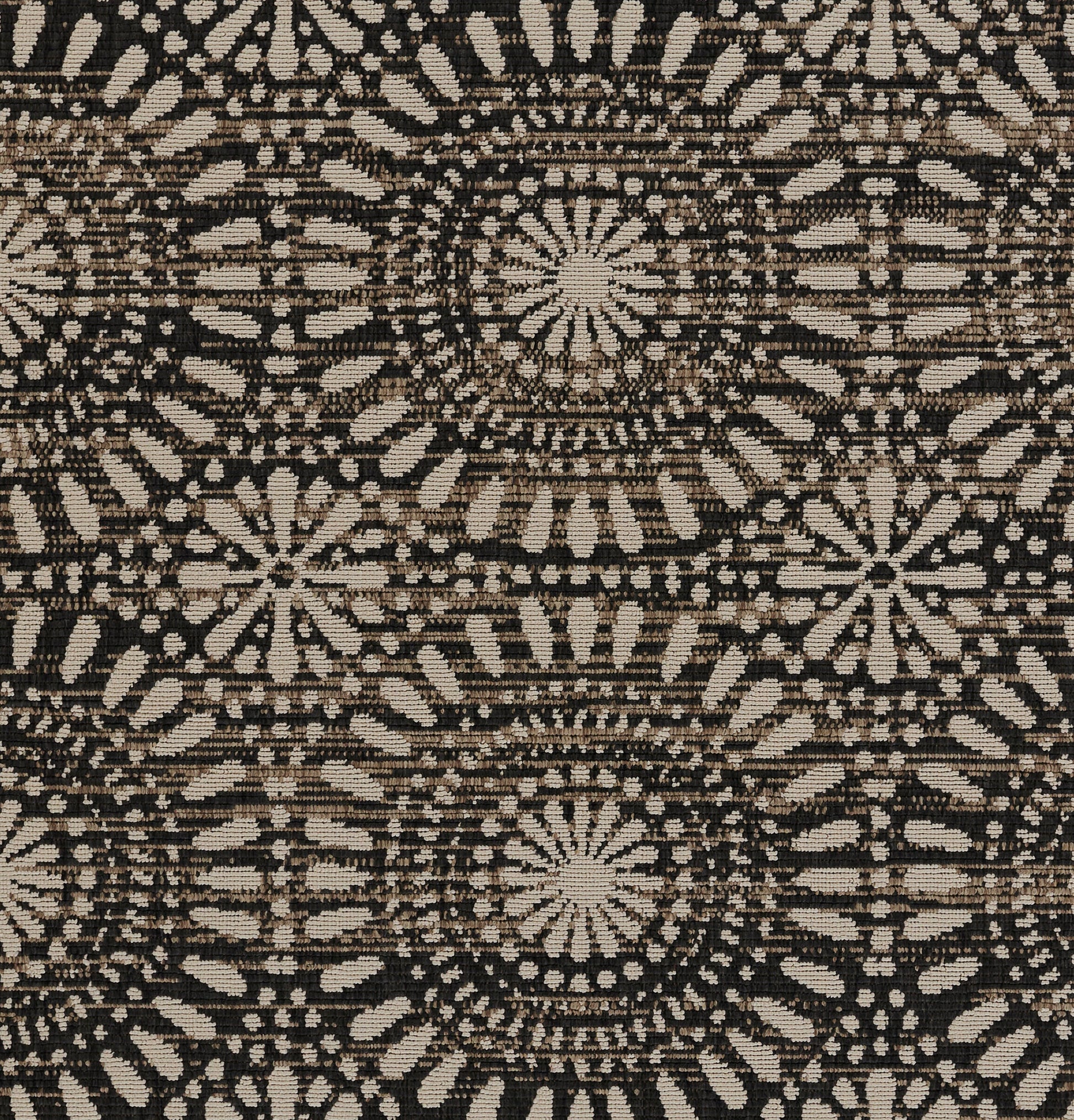 Beige and dark navy woven rug with repeating circular mandala patterns and radial sunburst motifs.