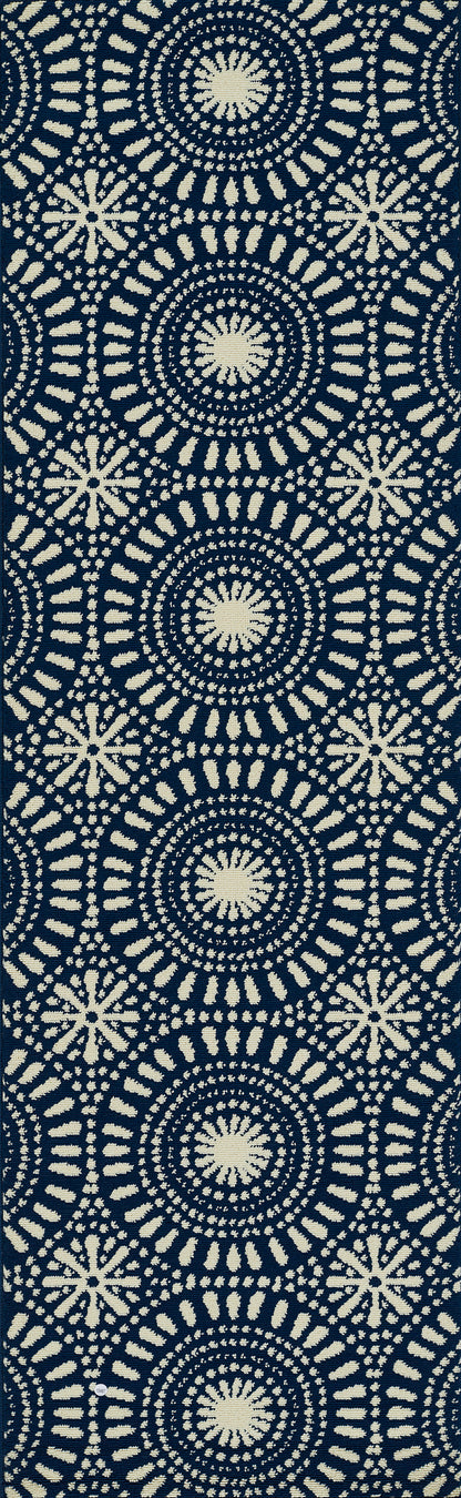 Navy textile with beige circular mandala medallions in a repeating geometric pattern.
