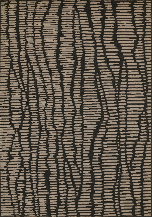 Tan and dark brown abstract striped rug with irregular beige dashes and woven texture.