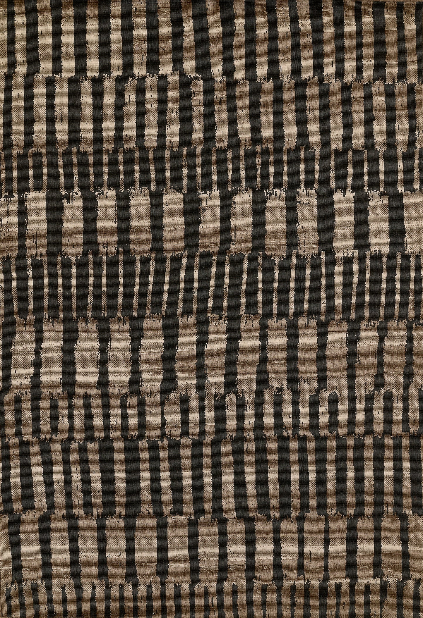 Brown and black woven rug with vertical rectangular bars; bold geometric pattern for living room decor.