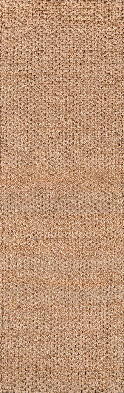 Natural jute weave in warm tan beige; rustic, textured rug or placemat for earthy decor.