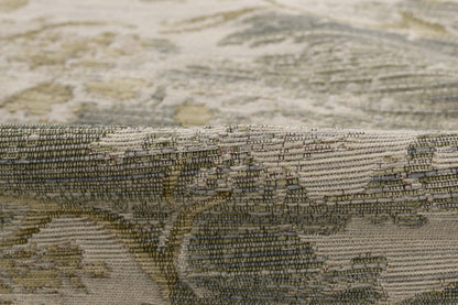 Earthy BARROBRN rug in beige, olive and brown with a floral damask pattern and woven texture.