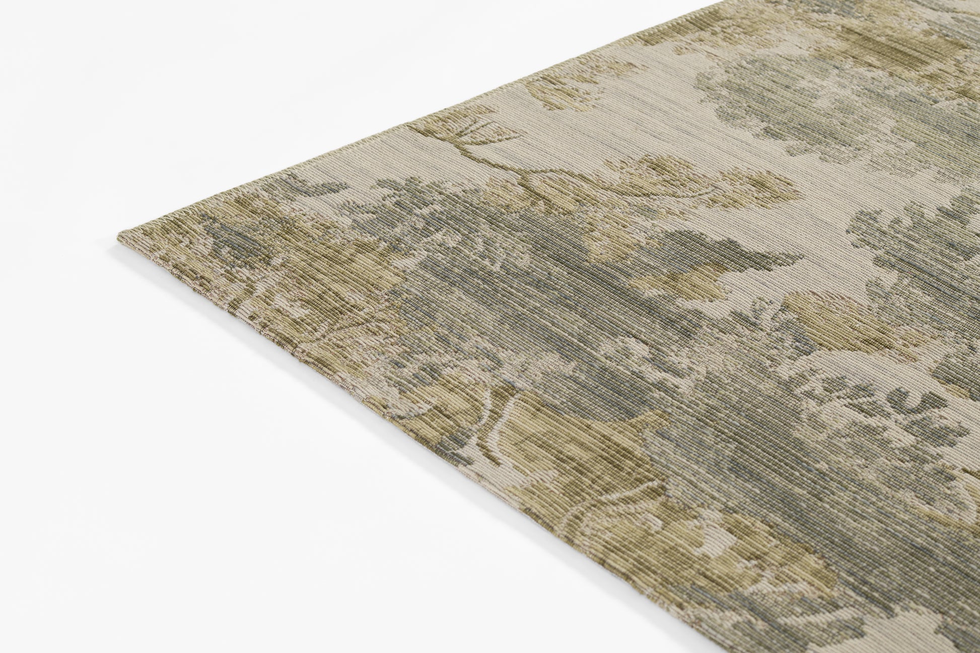 Earthy-toned area rug with muted beige, olive and gray botanical pattern; woven texture and vintage-inspired look.