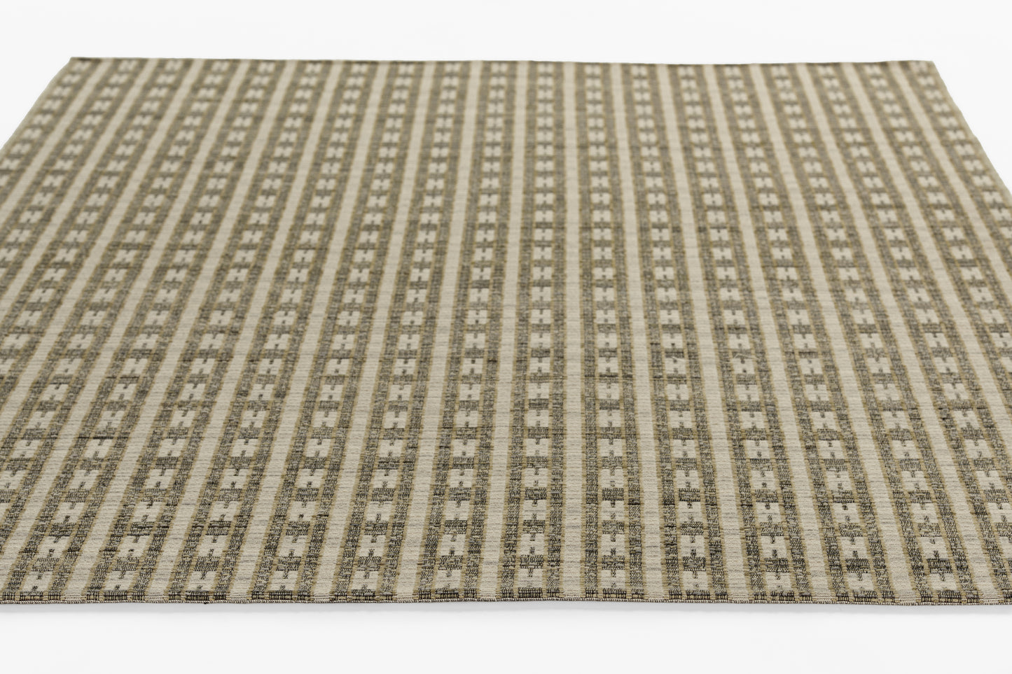Rectangular woven runner rug in beige, brown & gray with vertical geometric stripe pattern; neutral decor.