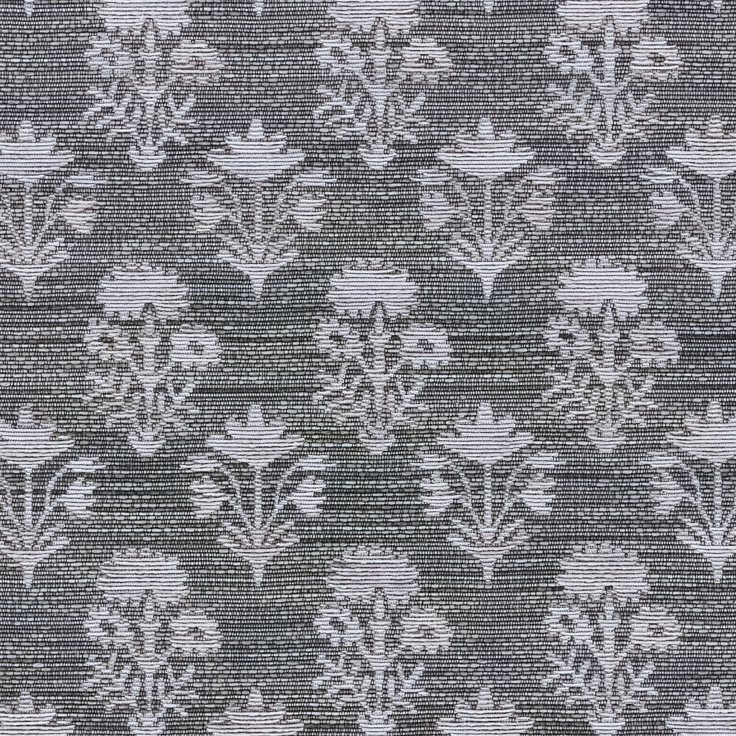 Gray-blue damask floral pattern rug with ornate blossoms on a dark charcoal background.