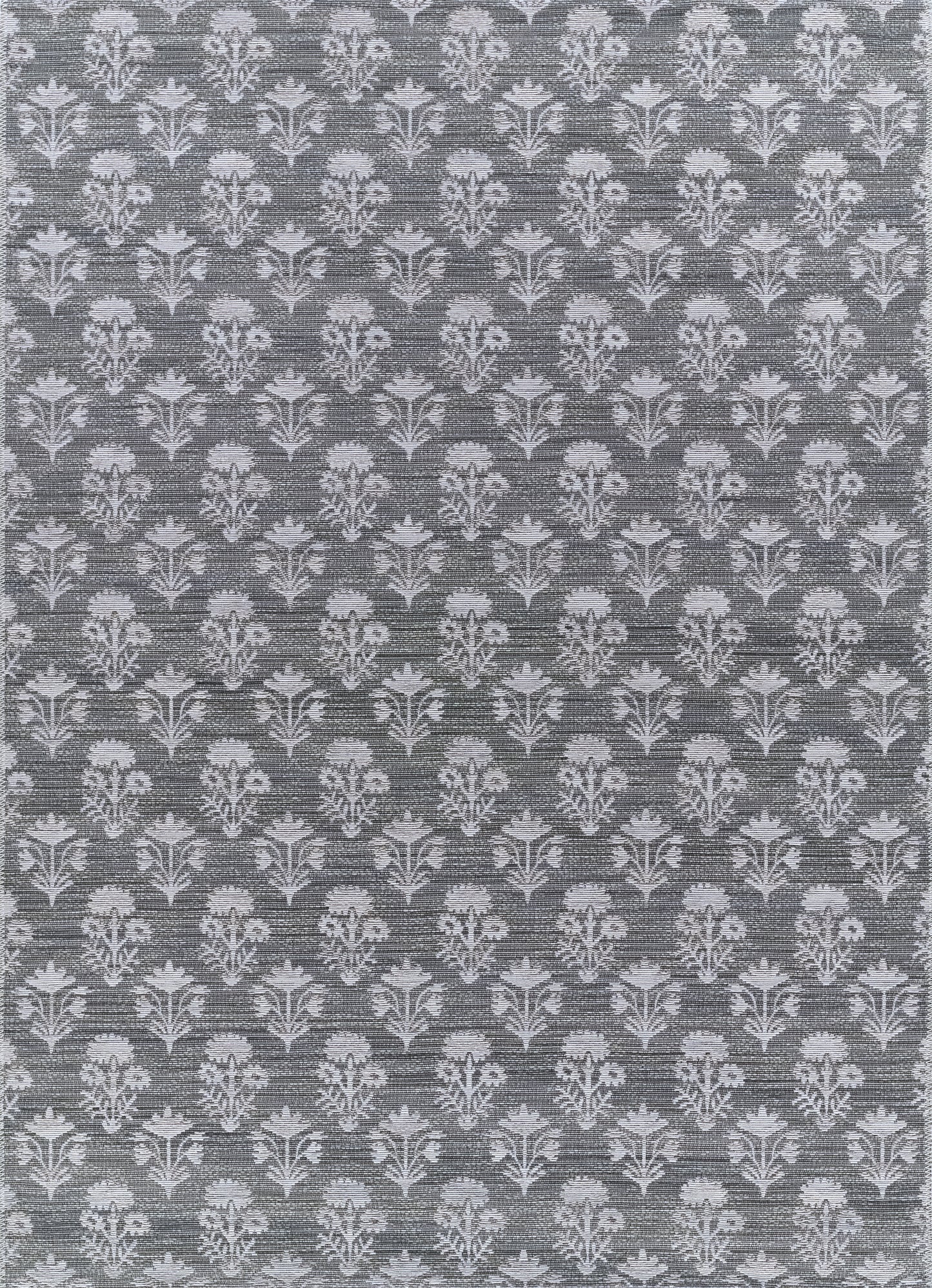 Charcoal gray woven rug with a pale blue-white damask floral pattern; 4' x 6'.