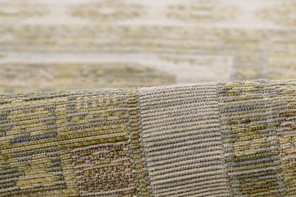 Barro Brown patchwork rug in olive, beige & tan tones, woven textured blocks.