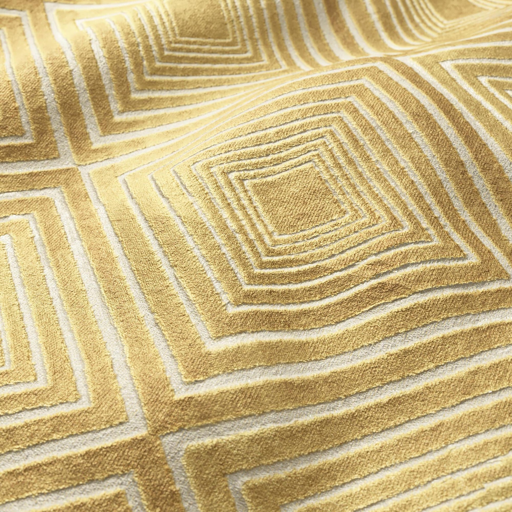 Gold, cream & rust geometric velvet fabric with a diamond pattern and plush texture.