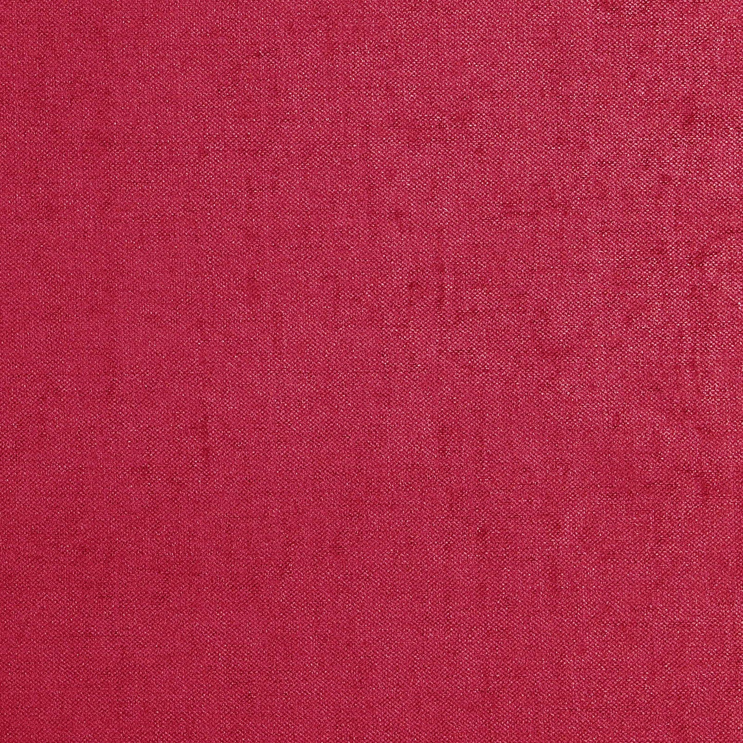 Magenta woven fabric close-up showing a textured textile in pink-red hues.