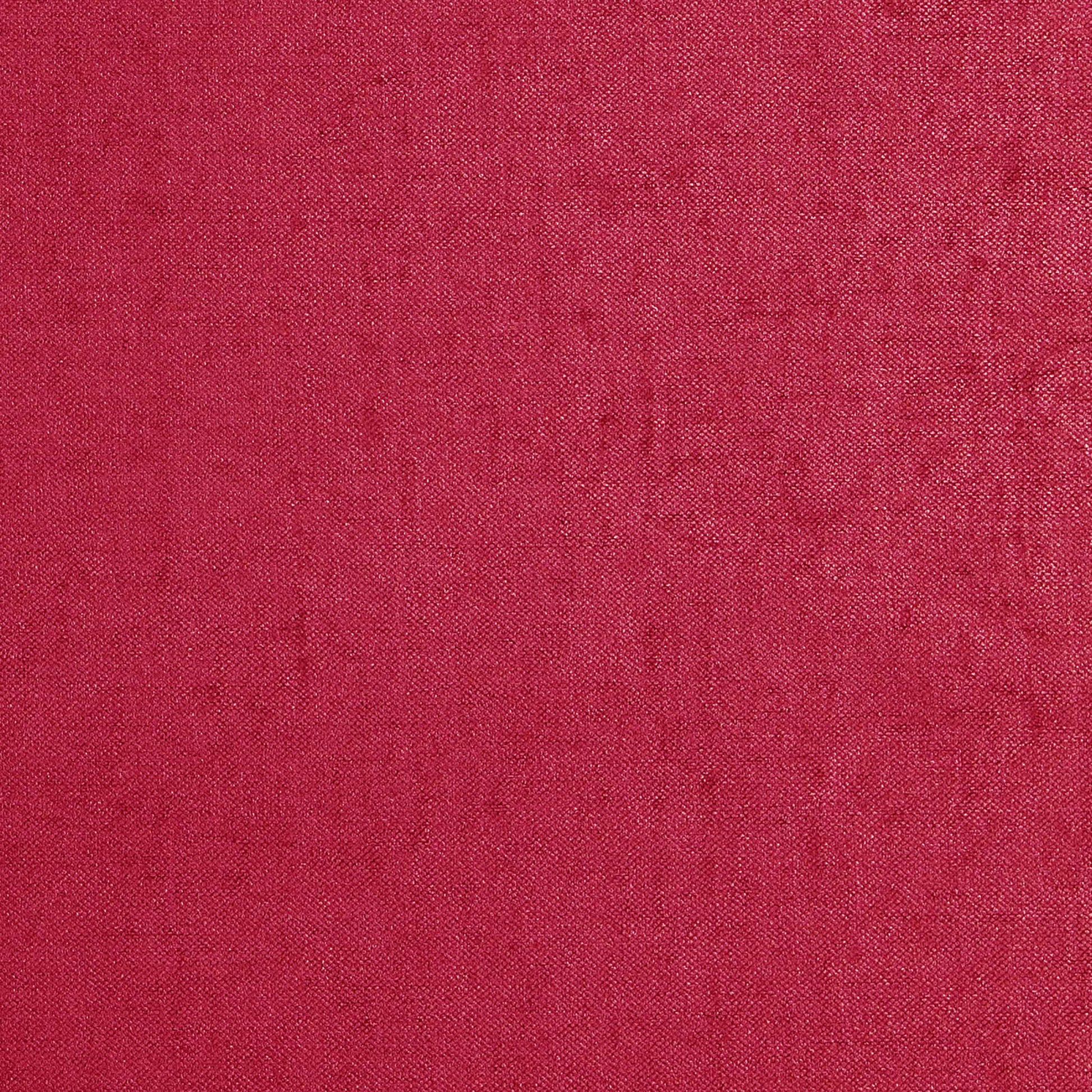 Magenta woven fabric close-up showing a textured textile in pink-red hues.