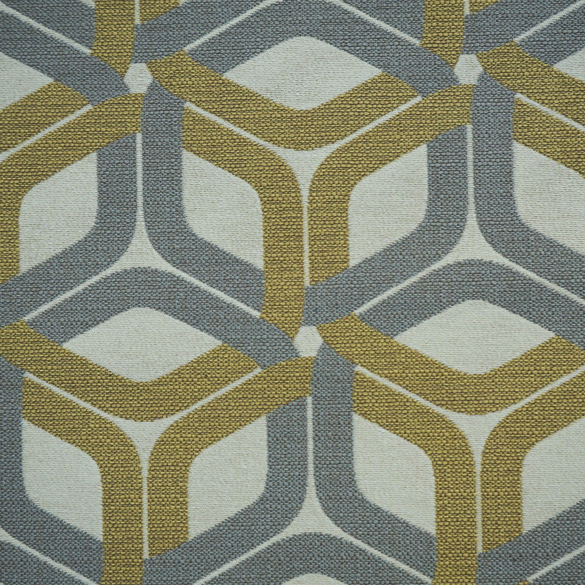Geometric interlocking chevron pattern on pale beige fabric in gray-blue and mustard.