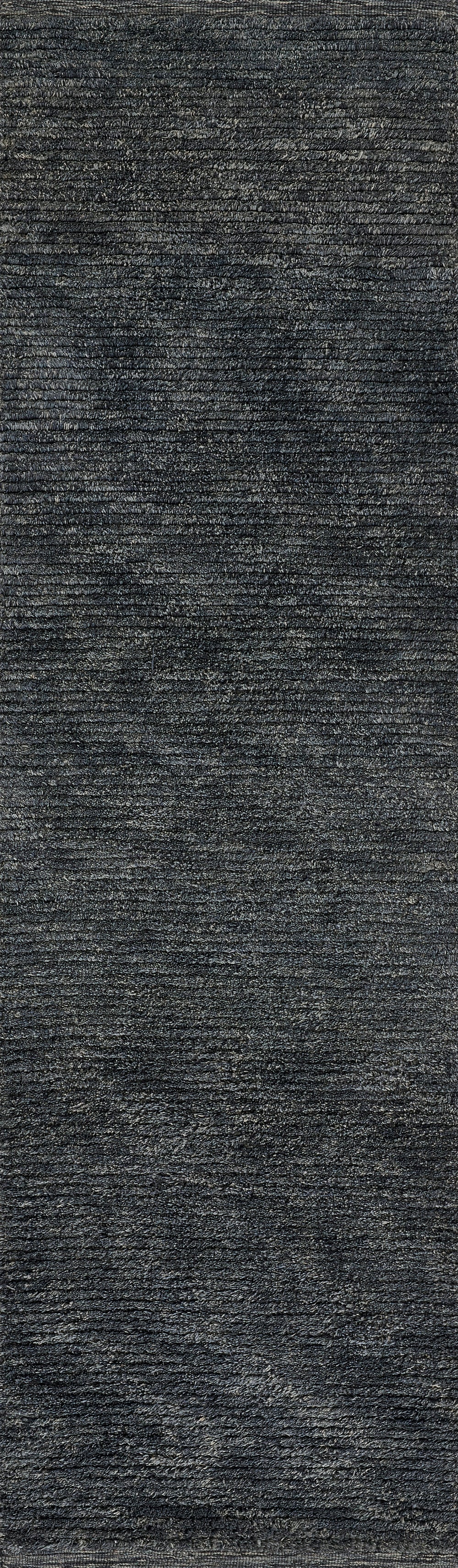 Dark charcoal textured plush fabric close-up with ribbed velvet-like pile, ideal for upholstery or rugs.