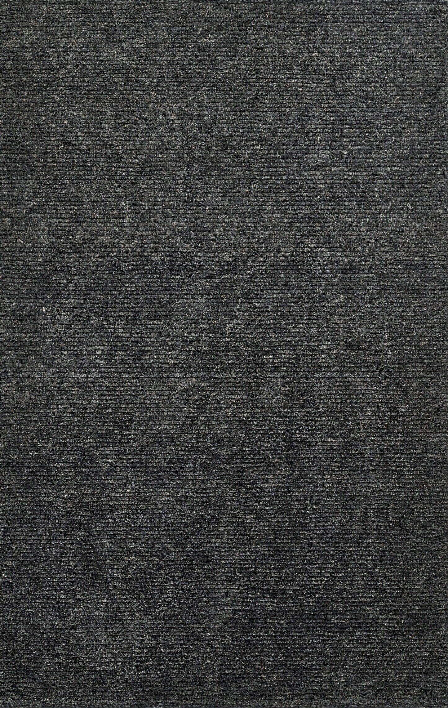 Dark charcoal rug texture with ribbed, corduroy-like surface and subtle horizontal lines.