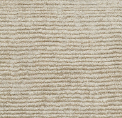 Beige ribbed rug texture with horizontal ridges and a soft, neutral floor‑covering look.