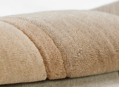 Beige taupe plush fleece blanket with thick loop pile, soft and cozy throw folds.