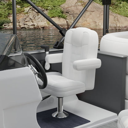 White captain chair with padded armrests on a chrome pedestal in a gray & white boat cockpit, water and shore behind.