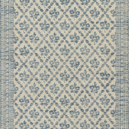Blue floral lattice rug on a beige background with decorative border along the edges.