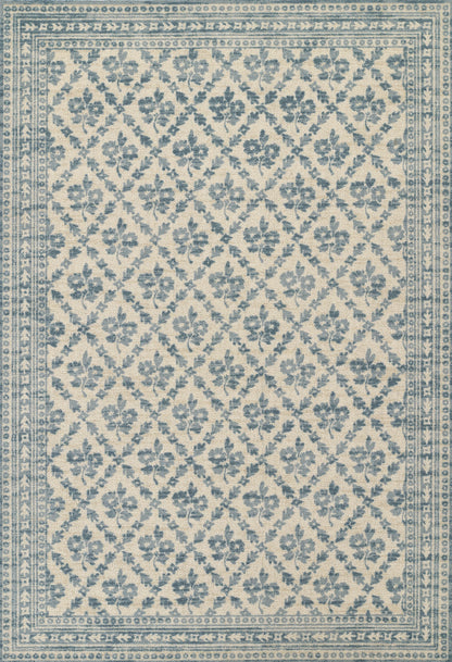 Blue and ivory woven area rug with a floral lattice pattern and decorative borders.
