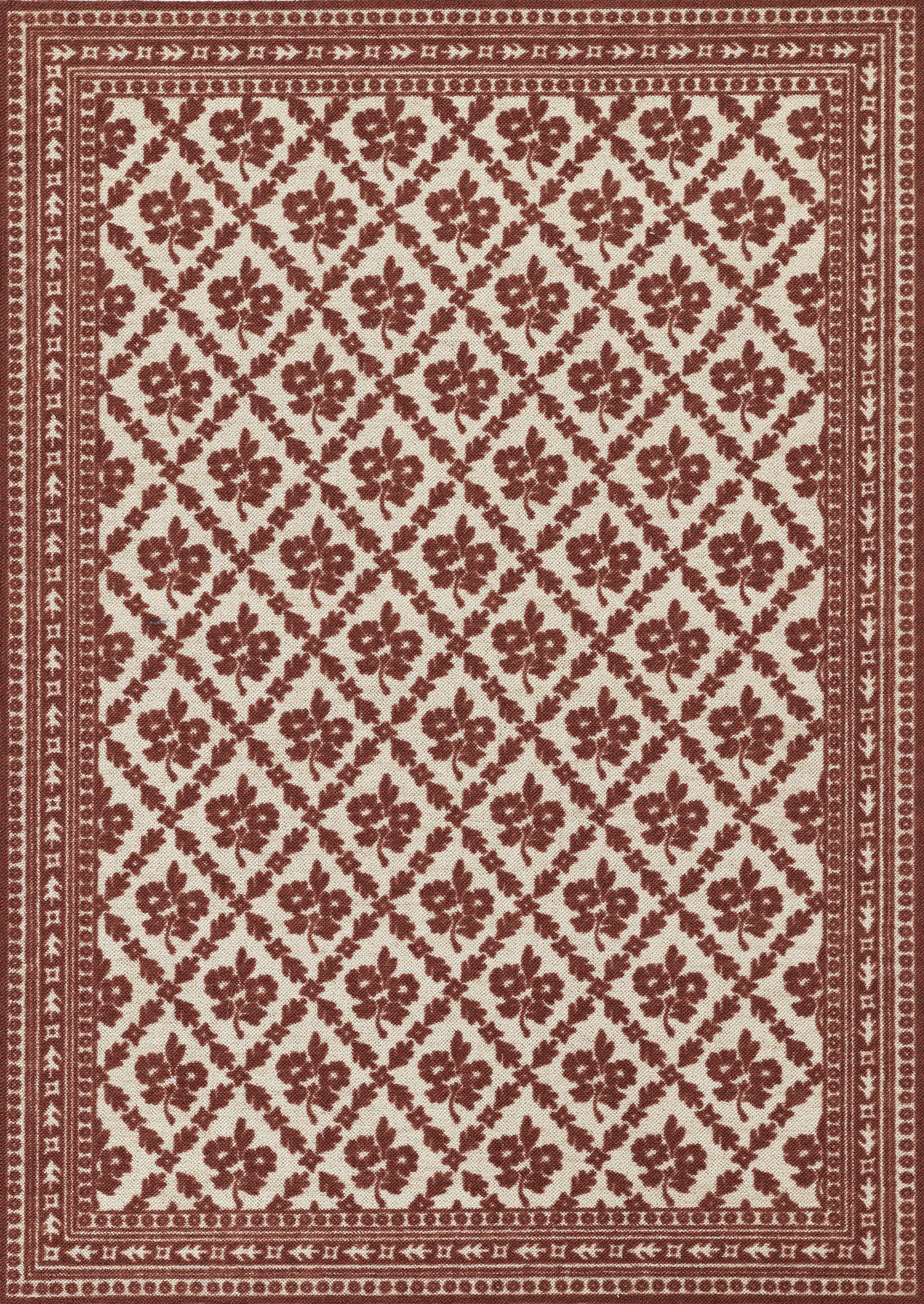 Red and cream patterned rug with diamond floral lattice and layered maroon borders.