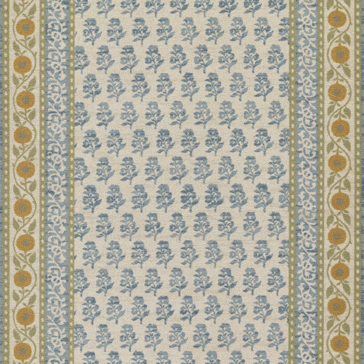 Beige area rug with blue floral print and decorative blue-olive borders featuring orange circular accents.