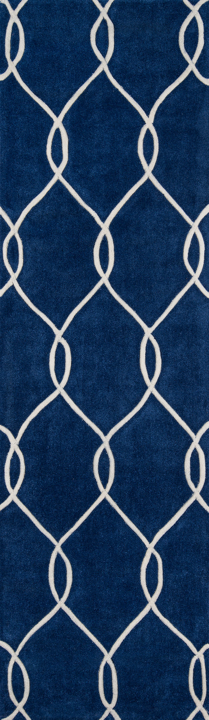 Navy blue rug with white interlocking lattice pattern; plush, modern geometric trellis design.