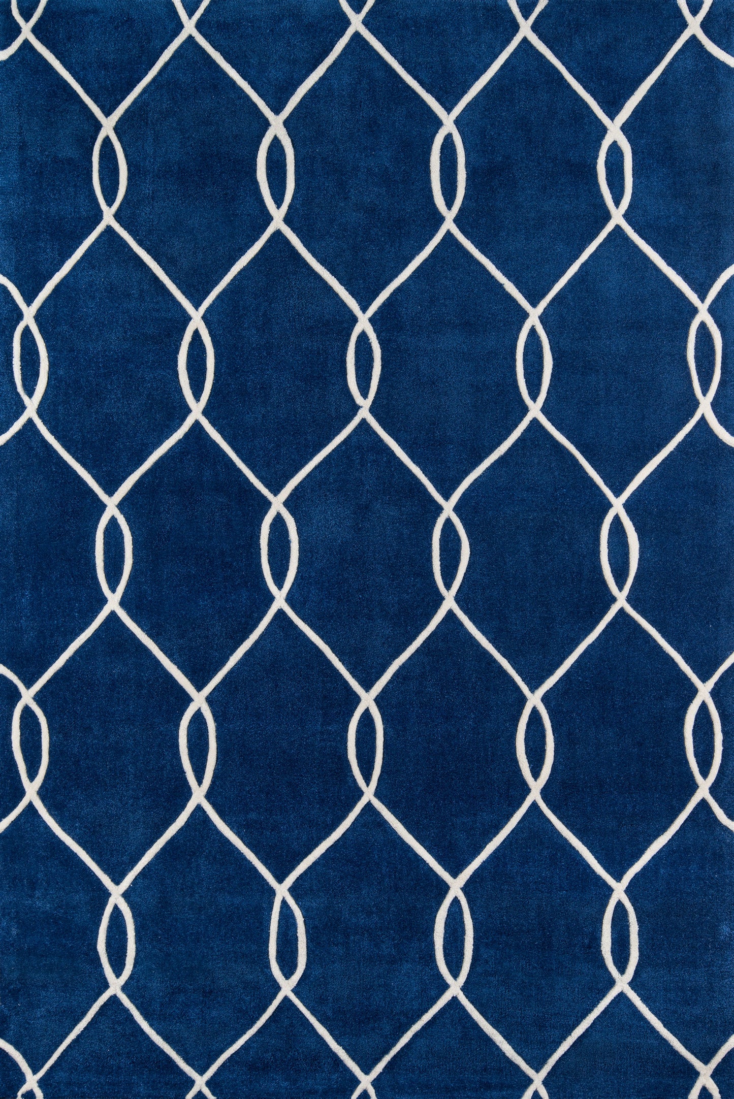 Navy blue rug with a white curved lattice pattern forming diamonds; modern geometric home decor.