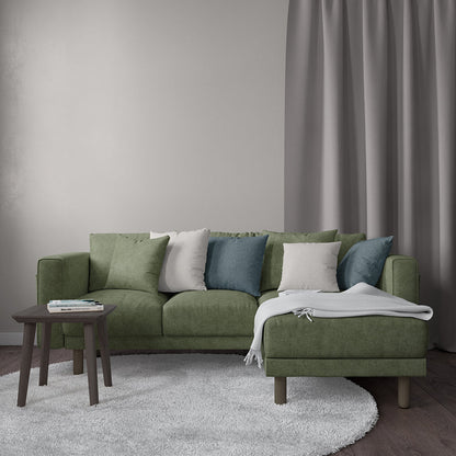 Ivy solid velvet fabric swatch in olive green with subtle texture.