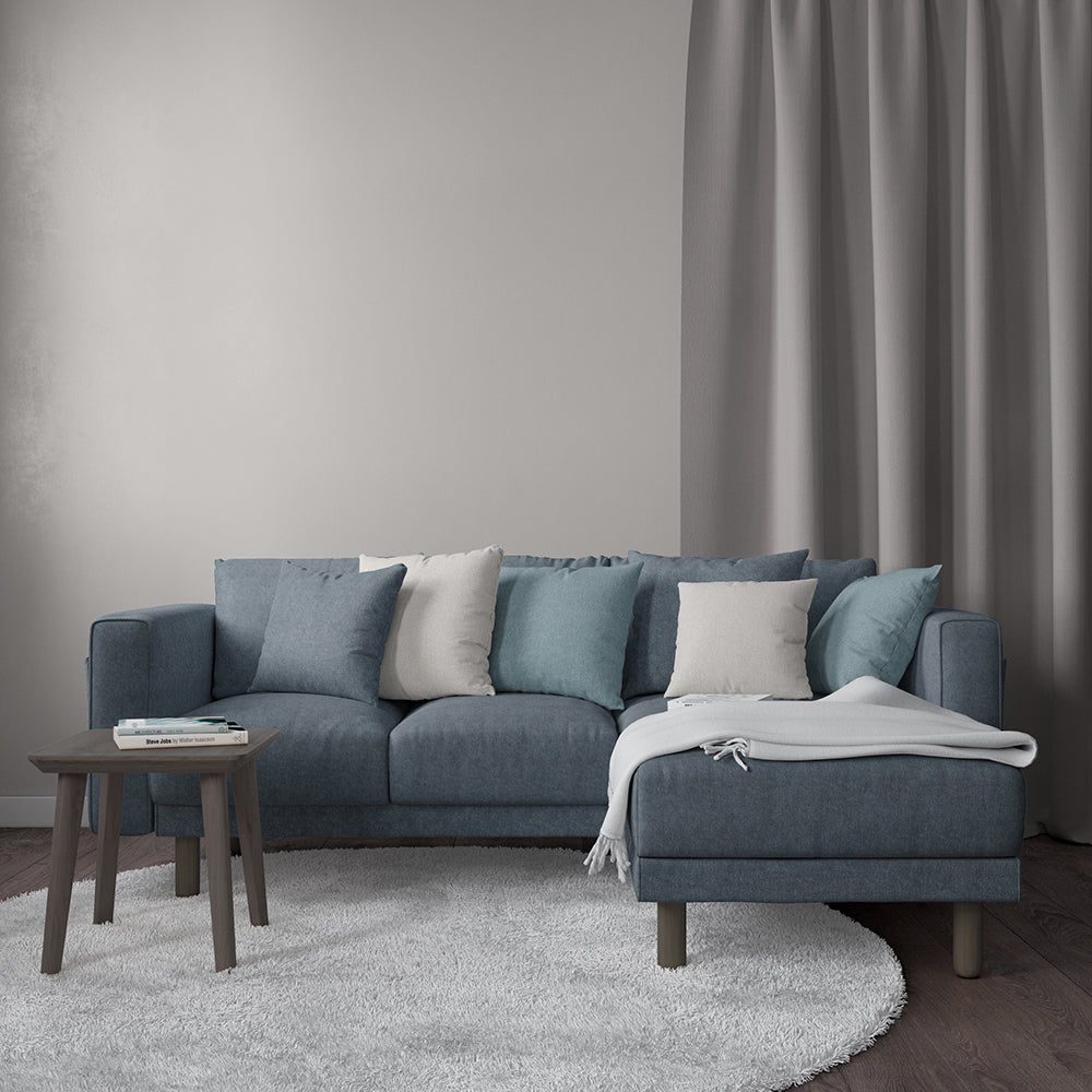 Blue solid velvet fabric swatch with textured surface.