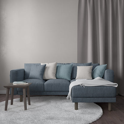Blue solid velvet fabric swatch with textured surface.