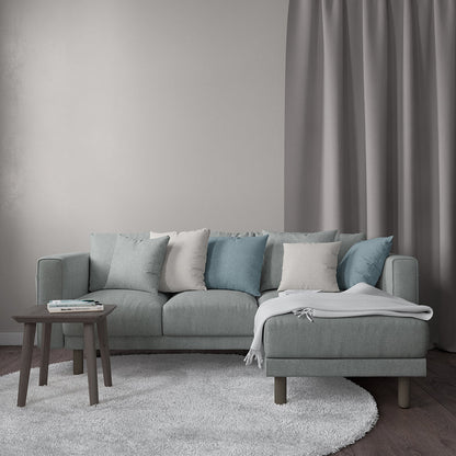Duck egg velvet upholstery fabric with subtle texture; solid color shown on cushions in a light blue-gray living room scene.