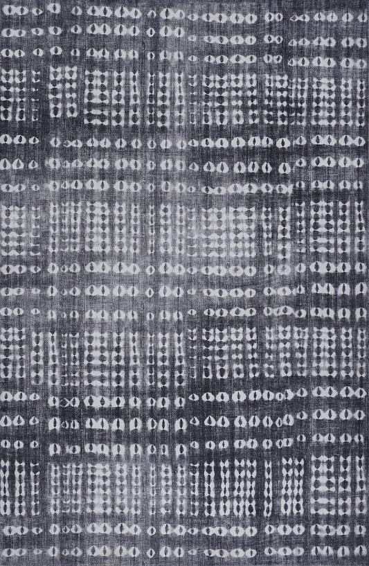 Navy blue fabric with white geometric dot and oval ikat pattern in repeating rows; woven textile for upholstery or apparel.