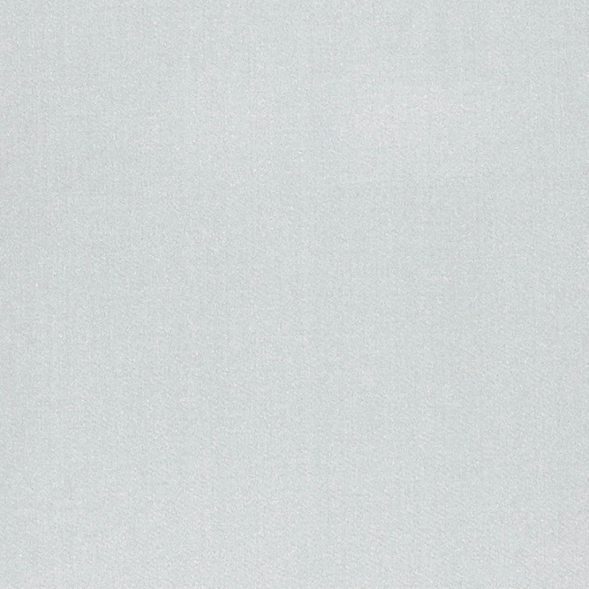 Blue textured fabric background with subtle weave.