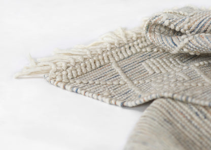 Neutral woven 2' x 8' runner rug with fringed edges, cream and beige tones, blue-gray stripes, wool blend, handmade style.